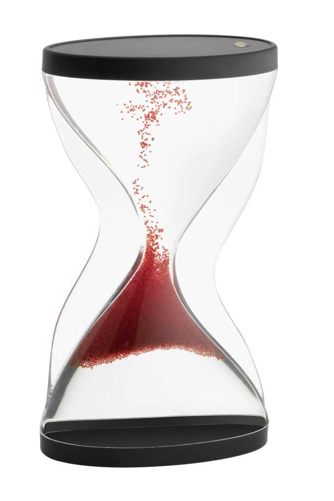 Transparente Sanduhr mit schwarzen Endkappen, rote Kugeln steigen in der Mitte nach oben