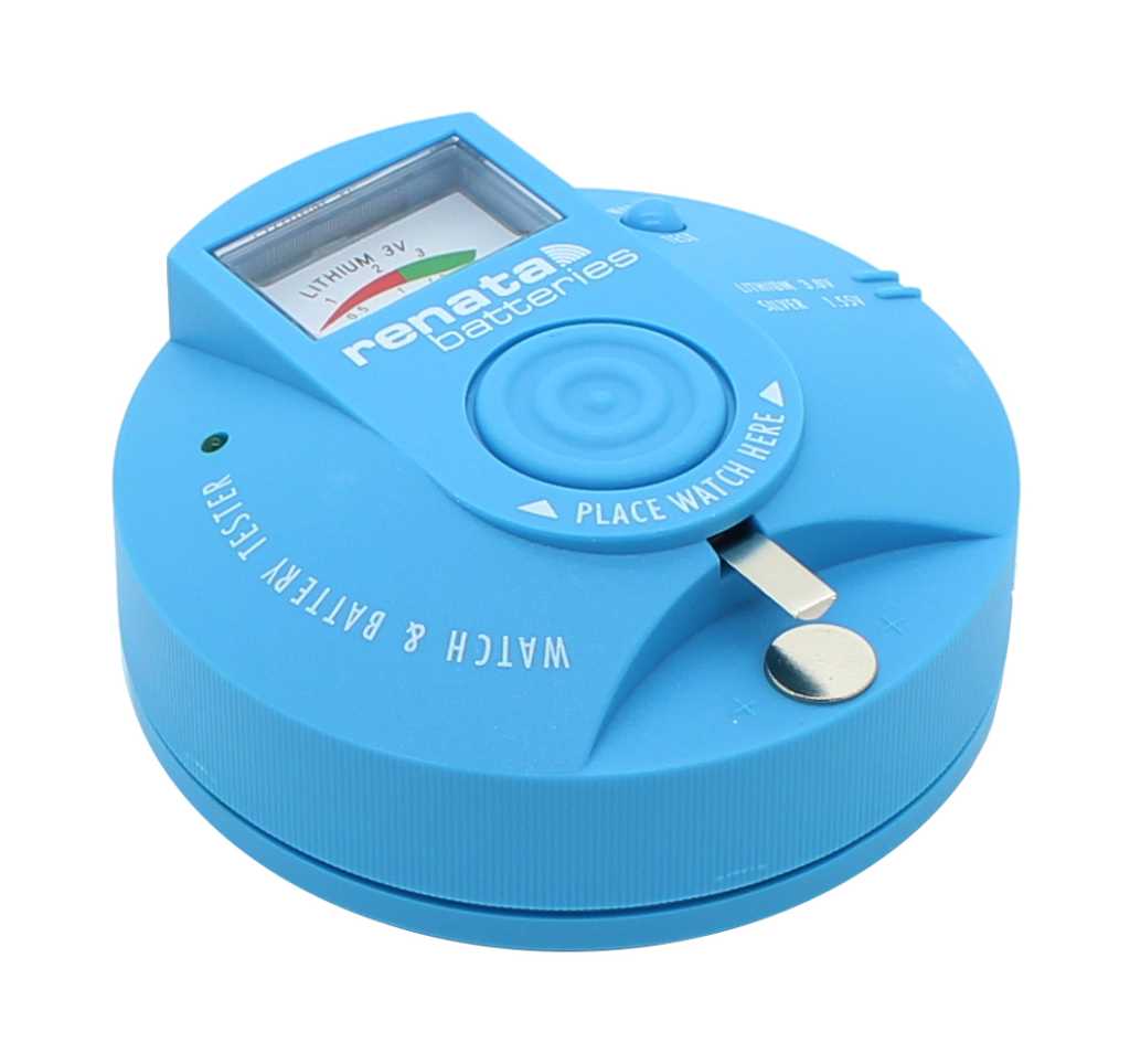 Blaues rundes Batterietestgerät mit analoger Skala, mittiger Ablagefläche und zwei Metallkontakten vorne rechts
