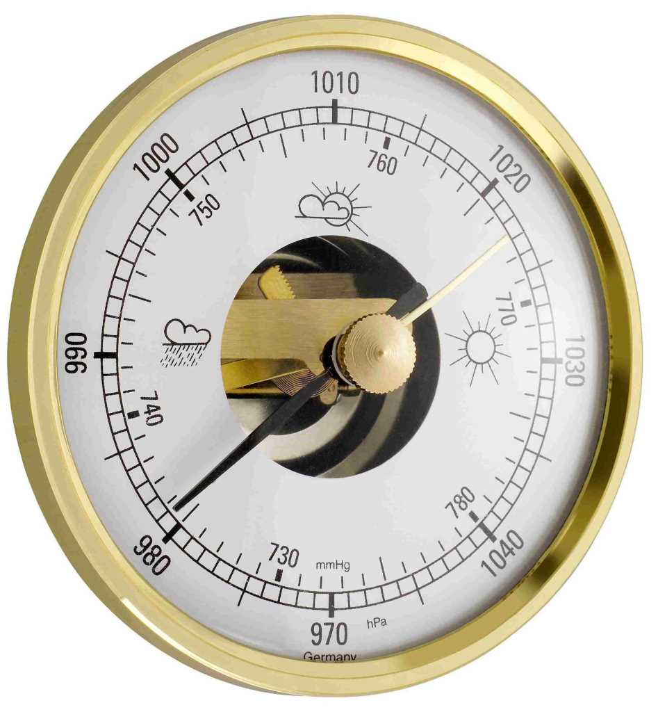 Rundes Barometer mit goldenem Rahmen, weißer Skala, zwei Zeigern und zentral sichtbarem Mechanismus