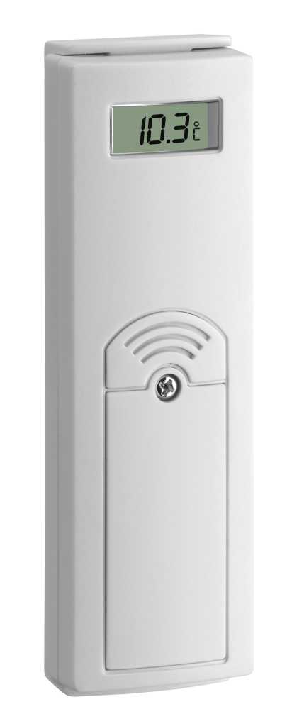 Weißes rechteckiges Gerät mit kleinem Display und Batteriefachschraube auf der Vorderseite