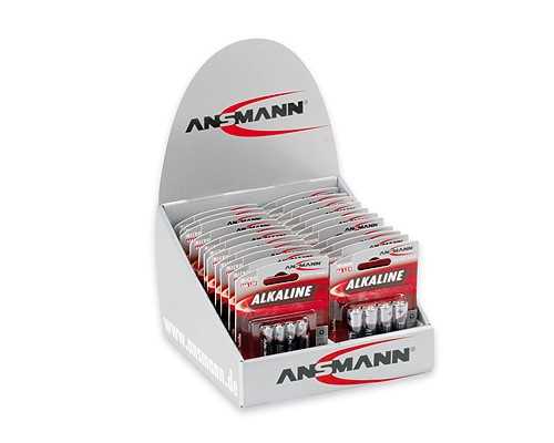 Graues Thekendisplay mit mehreren roten Batteriepacks in Reihen angeordnet, oben ein ovales Rückenschild mit Logo