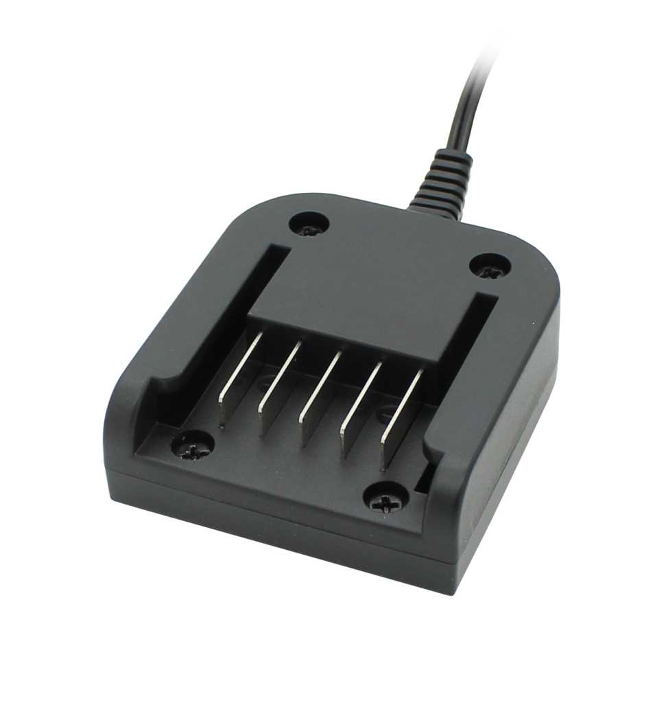 Schwarze Ladegerät-Basis mit Kabel, Steckschacht und fünf Metallkontakten, schräg von oben fotografiert